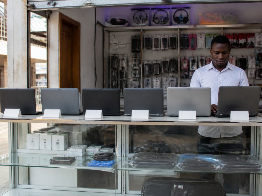 Laptops on display at a shop counter in Kampala